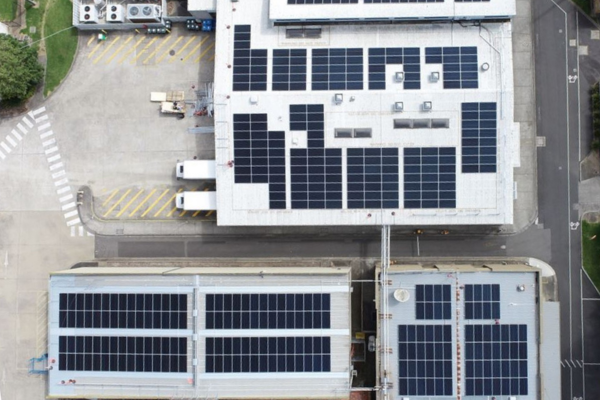 Solar panels spread across three roofs at the Central Production Unit at Repat